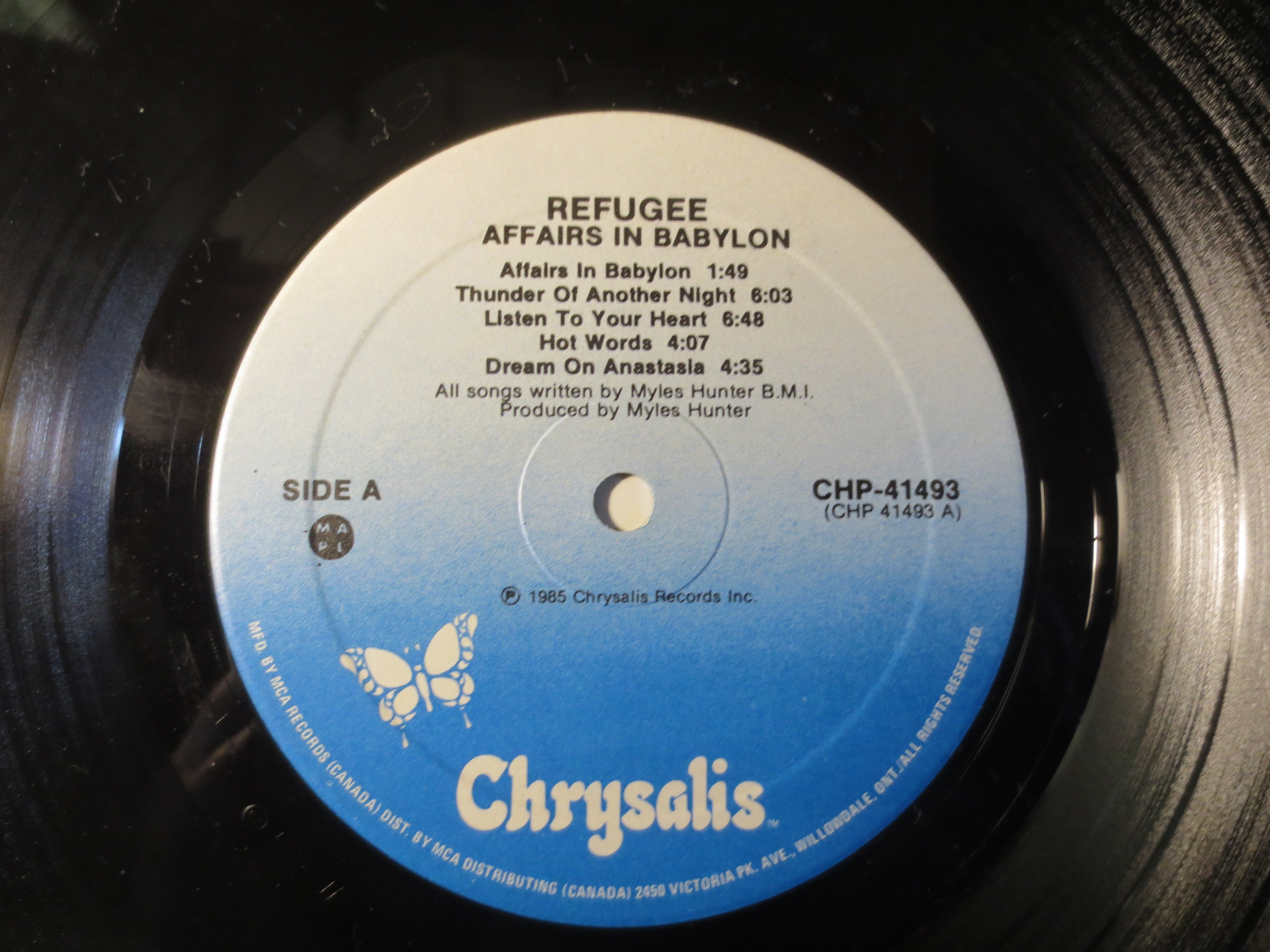 Refugee – Affairs in Babylon (1985) [Vinyl LP]
